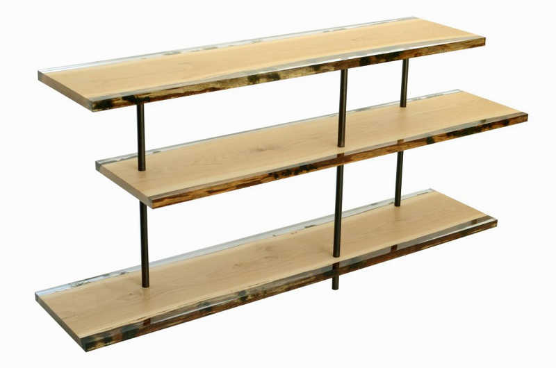 Illustration for article titled The Natural Moss on This Wooden Bookcase Is Preserved Forever in Resin